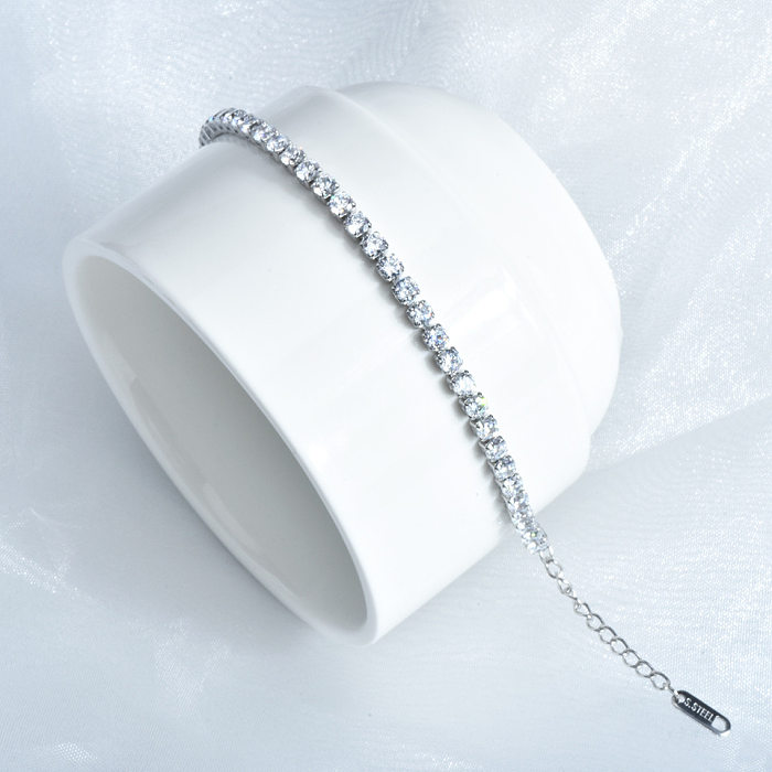 Pulseras de diamantes de imitación con incrustaciones de revestimiento de acero de titanio de color sólido de estilo simple de 1 pieza