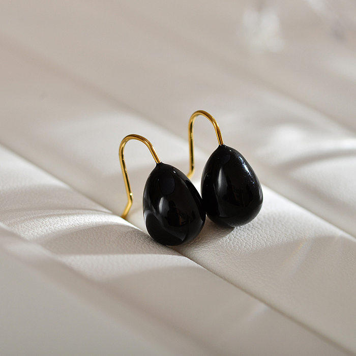 1 paire de clous d'oreilles en acier inoxydable plaqué or 18 carats, couleur unie, style moderne