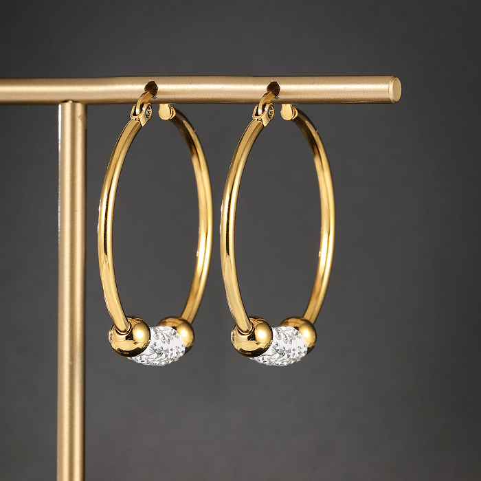 1 par de pendientes de aro chapados en oro de 18 quilates con incrustaciones de diamantes de imitación chapados en acero inoxidable con círculo brillante de estilo moderno