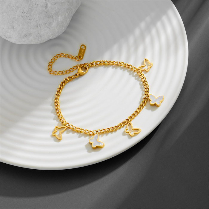 Elegante Stern-Schmetterlings-Armbänder mit Titan-Stahlbeschichtung und Inlay-Muschel, 18 Karat vergoldet