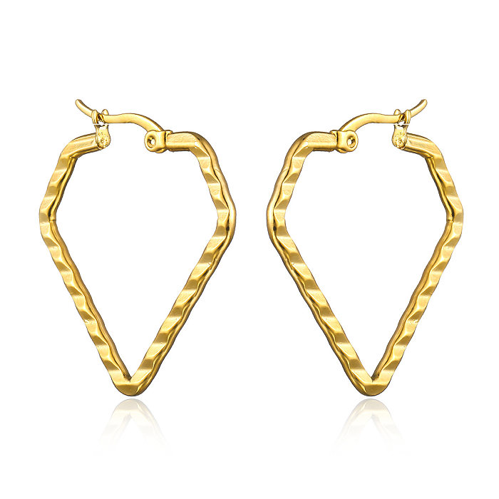 1 par de brincos banhados a ouro de aço inoxidável em formato de coração estilo simples