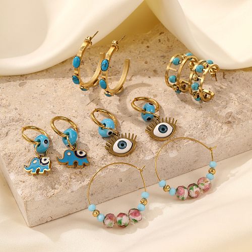 1 paire de boucles d'oreilles plaquées or Turquoise en acier inoxydable, Style Simple, incrustation de placage d'oeil