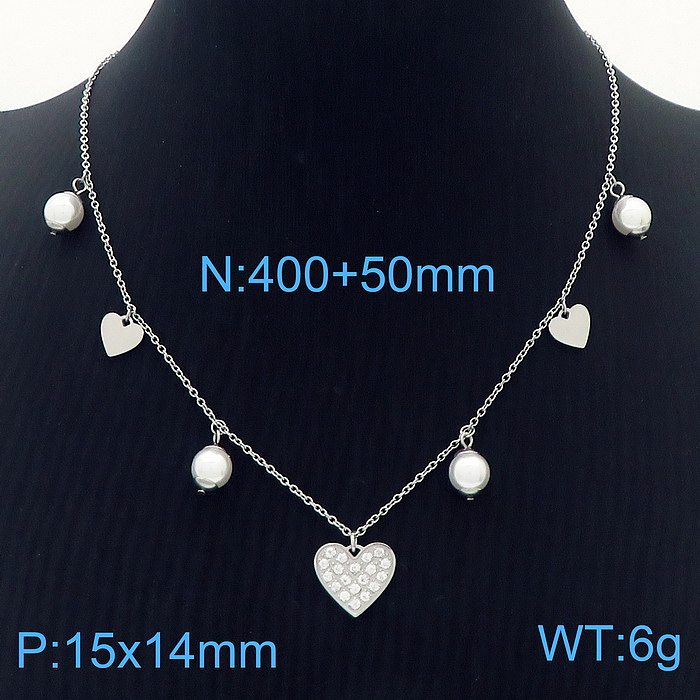 Collier pendentif plaqué or 18 carats en acier inoxydable en forme de cœur d'étoile de mode