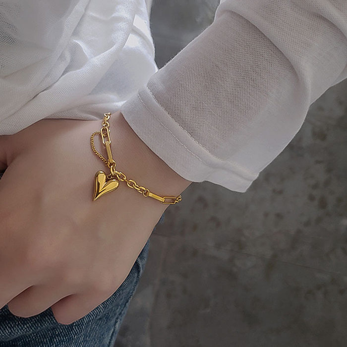 Elegante estilo vintage em forma de coração pulseiras banhadas a ouro 18K de titânio
