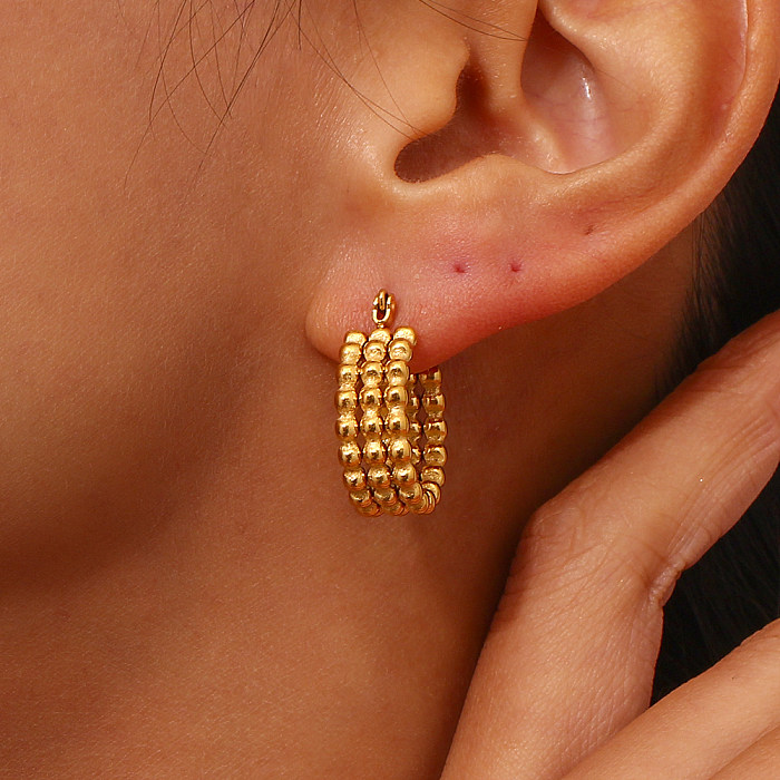 1 paire de boucles d'oreilles créoles rondes en acier inoxydable plaqué or 18 carats, style simple