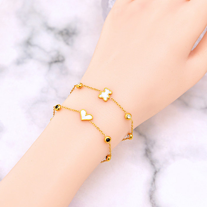 Bracelets de placage en acier titane de fleur de forme de coeur de feuille de style simple