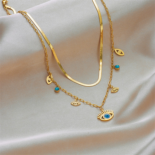 Mehrschichtige Halsketten aus Edelstahl mit Auge im Vintage-Stil. Vergoldete türkisfarbene Edelstahl-Halsketten