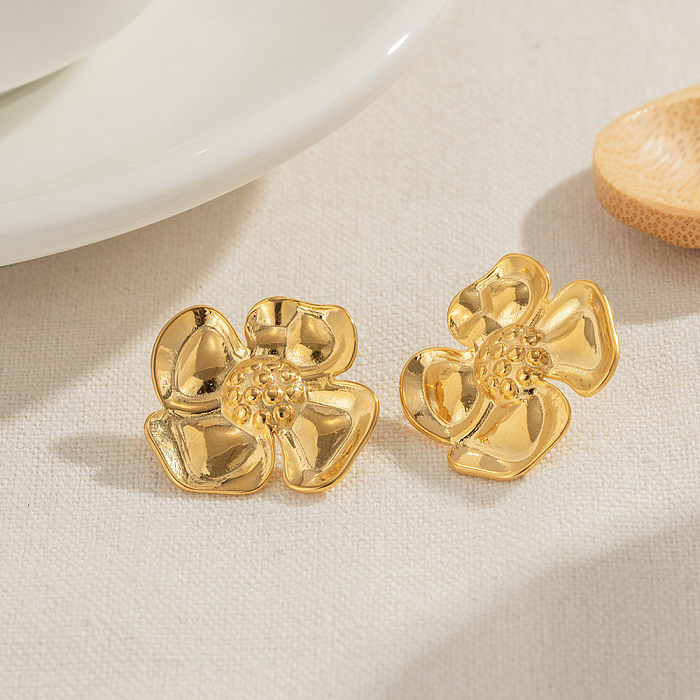 1 par de aretes chapados en oro de 18 quilates de acero inoxidable con revestimiento de flores de estilo simple
