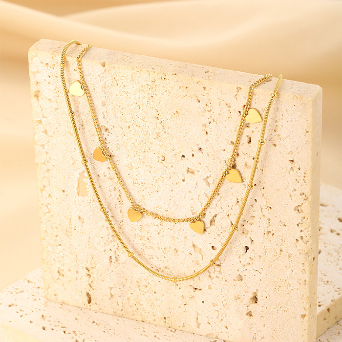 Collares de doble capa chapados en oro de 18K chapados en acero inoxidable con forma de corazón de estilo clásico