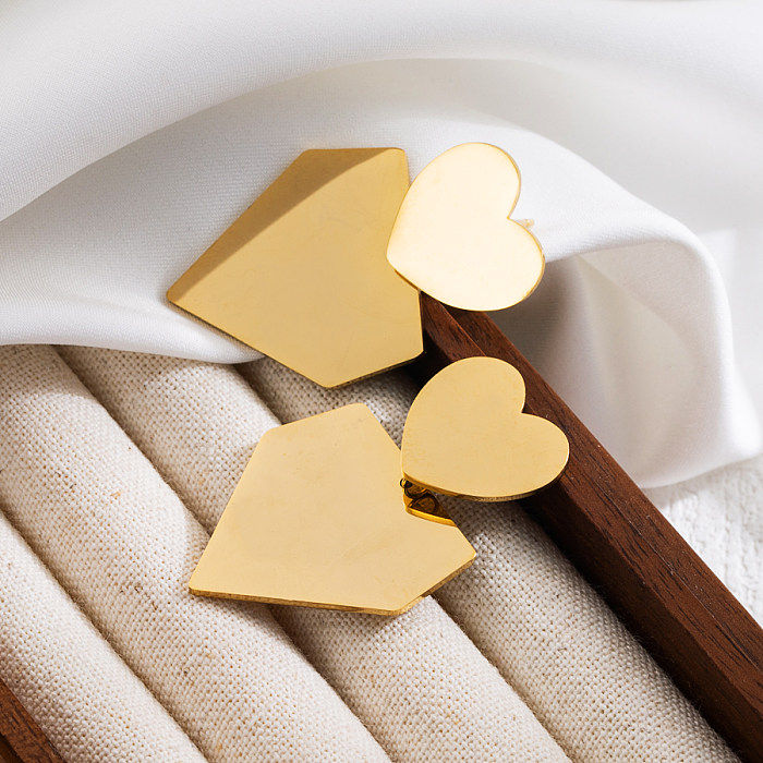 1 par de pendientes colgantes chapados en oro de 18 quilates de acero inoxidable tridimensional con forma de corazón dulce básico estilo IG