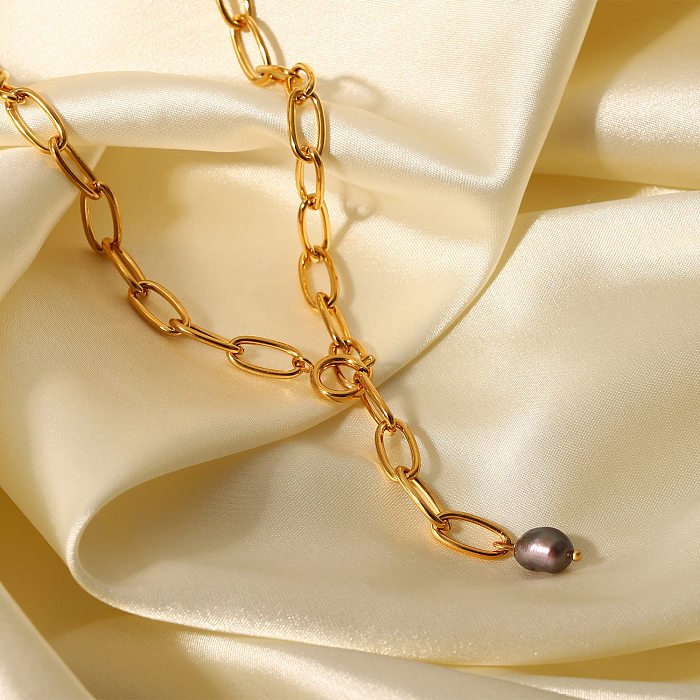 Modische Halskette aus 18-karätigem Gold mit schwarzem Perlenanhänger und Edelstahl