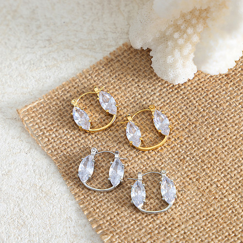 1 par de elegantes pendientes chapados en oro de 18 quilates con incrustaciones de círculos brillantes de acero inoxidable y piedra de cristal