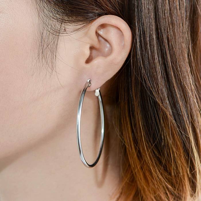 1 paire de boucles d'oreilles créoles en acier inoxydable, couleur unie, Style moderne exagéré