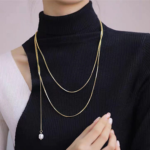 Schlichter Stil, geometrische Edelstahl-Intarsien, künstliche Perlen, 18 Karat vergoldete Pulloverkette, lange Halskette