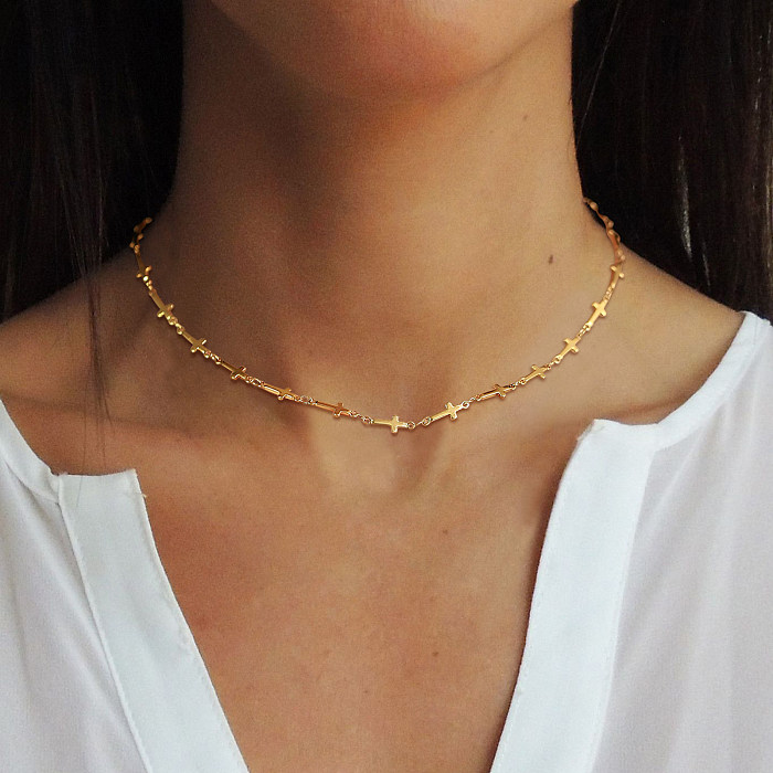Collar chapado en oro de 18 quilates con revestimiento de acero inoxidable de color sólido cruzado de estilo simple estilo INS