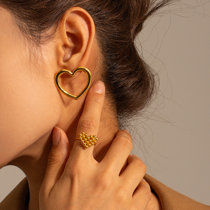 1 par de brincos de orelha banhados a ouro 18K estilo IG estilo simples em forma de coração