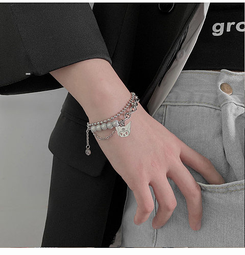 Bracelet monstre Double couche Version coréenne, couture de perles réfléchissantes, Bracelet en acier titane, accessoires mignons