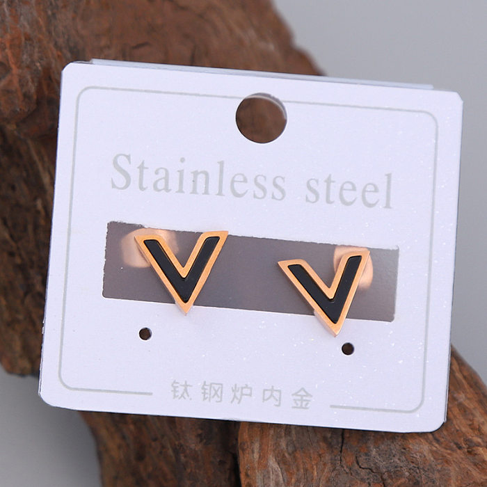 زوج واحد من ترصيع الأذن بتصميم بسيط غير رسمي على شكل حرف V من الفولاذ المقاوم للصدأ