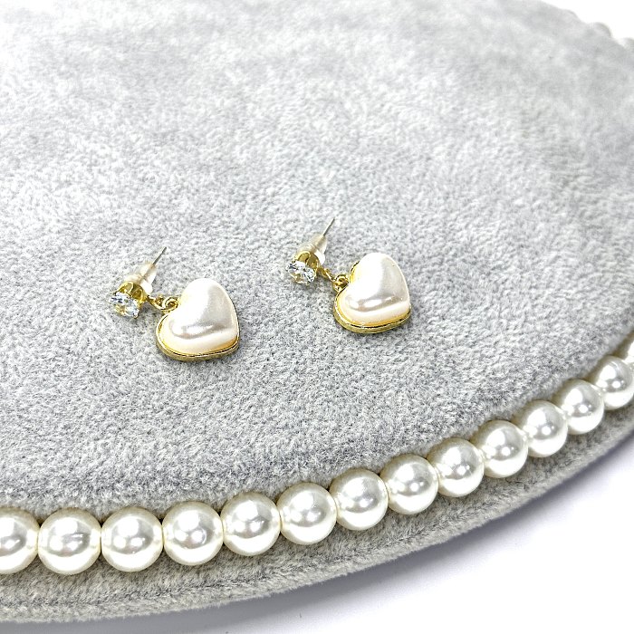 1 paire de boucles d'oreilles élégantes et mignonnes en forme de cœur, incrustation de perles artificielles en acier inoxydable, strass
