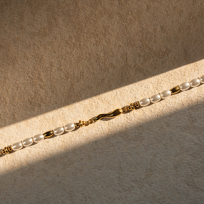 Pulseiras folheadas a ouro de aço titânio com contas redondas de aço inoxidável estilo simples 18K
