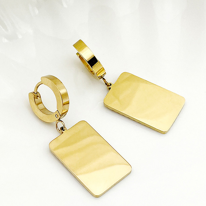 1 par de pendientes colgantes chapados en oro de acero inoxidable con forma de corazón de Palma de viaje de estilo Simple