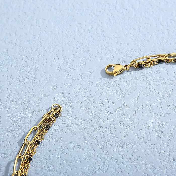 Einfache dreischichtige Halskette mit runder Platte aus Edelstahl und Gold für Damen