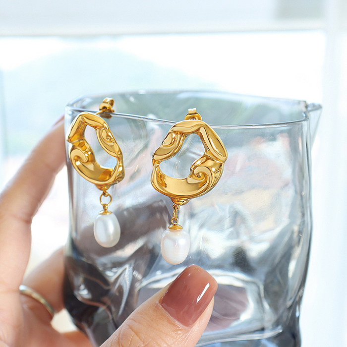 1 Paar modische unregelmäßige Edelstahl-Perlen-Höhlen-Ohrringe