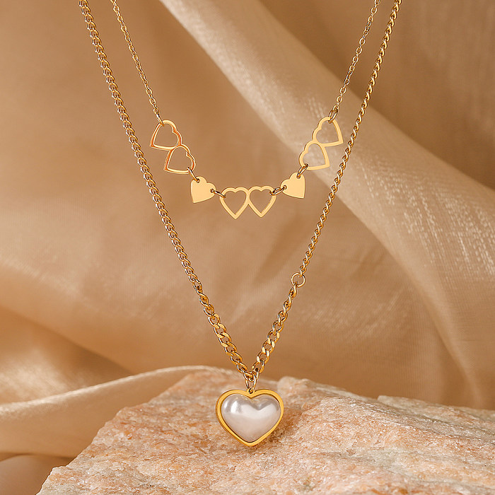 Collier pendentif plaqué or 18 carats avec incrustation en acier inoxydable en forme de cœur de style simple