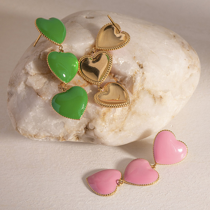 1 paire de boucles d'oreilles pendantes en acier inoxydable plaqué or 18 carats en forme de cœur doux de Style IG