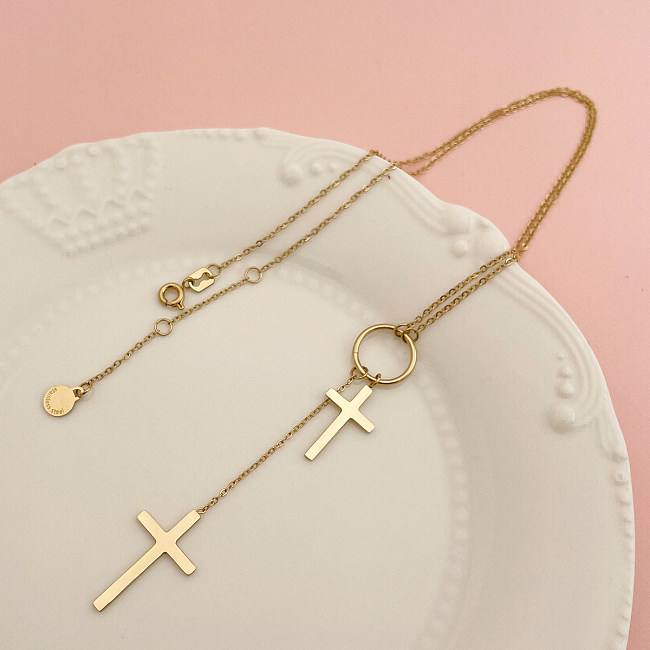 Collier pendentif élégant et doux avec croix artistique en acier inoxydable, pompon de polissage plaqué or