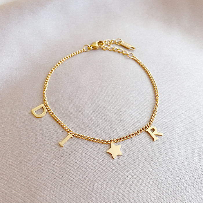 Bracelets en acier titaniques d'étoile de lettre de style simple plaquant des bracelets d'acier inoxydable