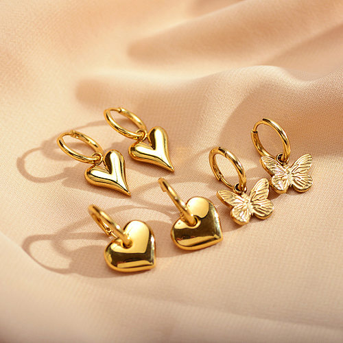 1 paire de boucles d'oreilles élégantes et luxueuses, Style Simple, en forme de cœur, plaqué papillon, en acier inoxydable, plaqué or