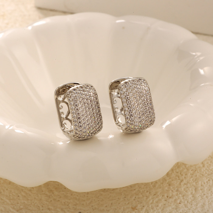 Brass inlaid zircon rectangular hollow texture ear buckle