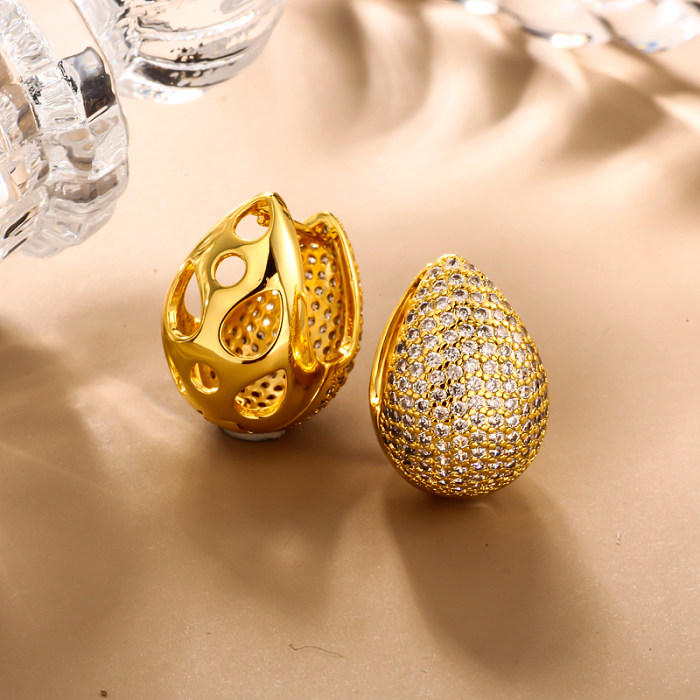 Brass droplet shaped hollow inlaid zircon ear buckle