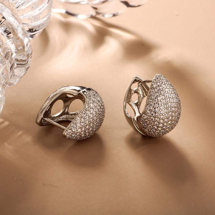 Brass droplet shaped hollow inlaid zircon ear buckle
