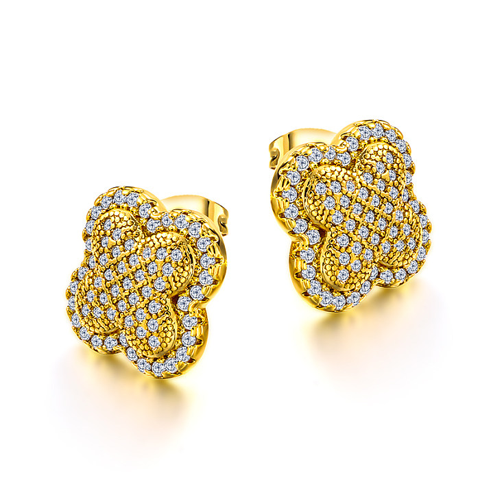 Brass clover inlaid zircon ear buckle