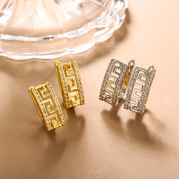 Brass rectangular inlaid zircon hollow pattern ear buckle