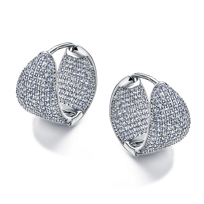 Boucle d'oreille en laiton et zircon incrusté double face
