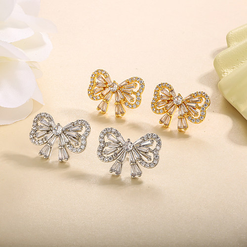 Brass hollow bow with inlaid zircon earrings