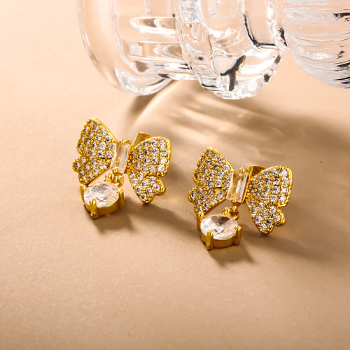 Brass bow with zircon earrings embedded