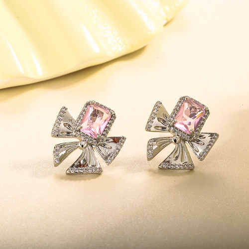 Brass bow, pink zircon inlaid with zircon earrings