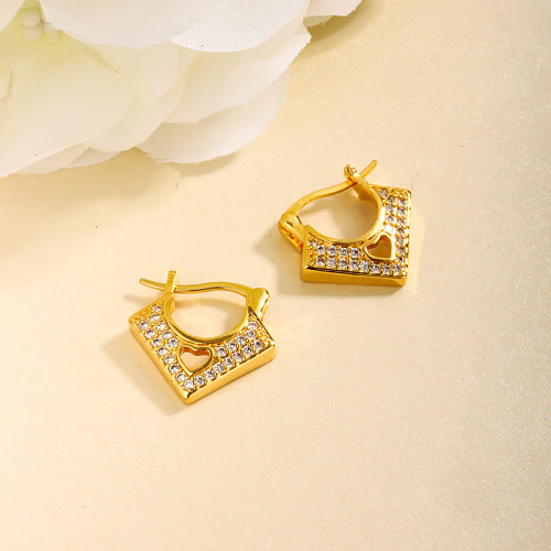 Brass V-shaped hollow heart-shaped hollow inlaid zircon ear buckle