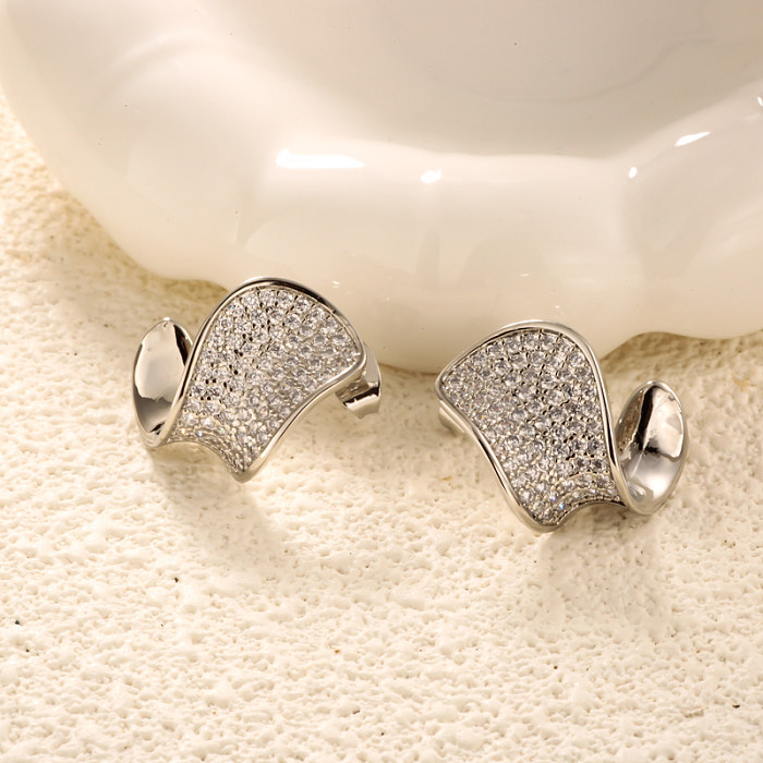 Brass twisted curve inlaid zircon earrings