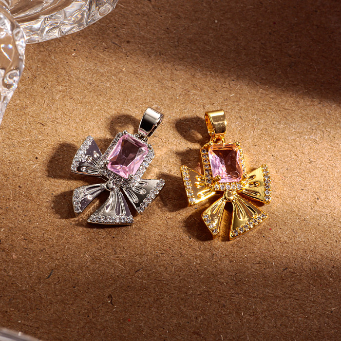 Brass bow inlaid with zircon pink zircon simple and versatile pendant