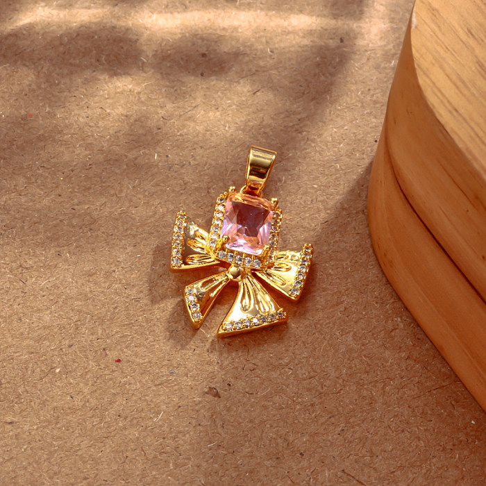 Brass bow inlaid with zircon pink zircon simple and versatile pendant