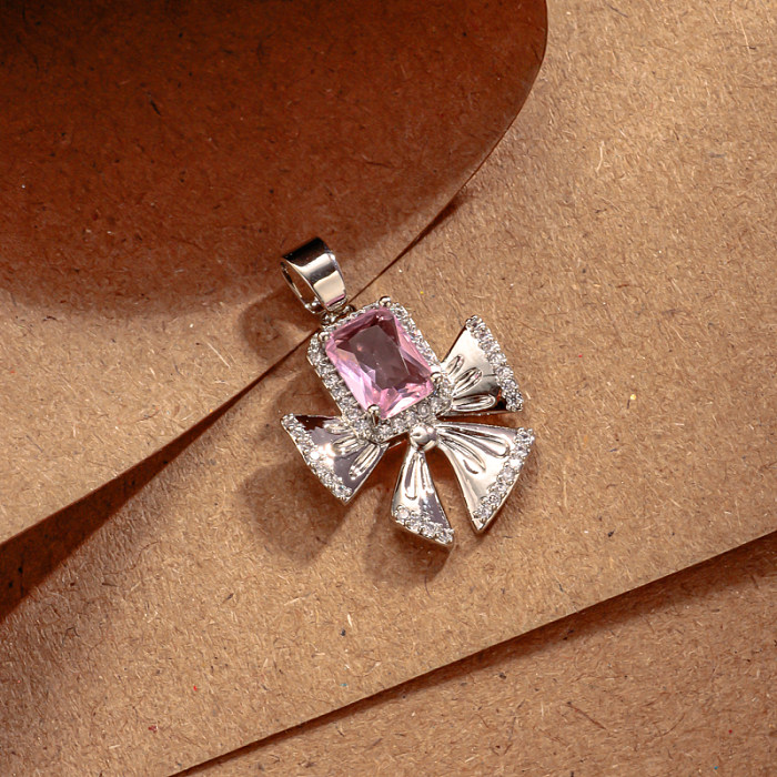 Brass bow inlaid with zircon pink zircon simple and versatile pendant