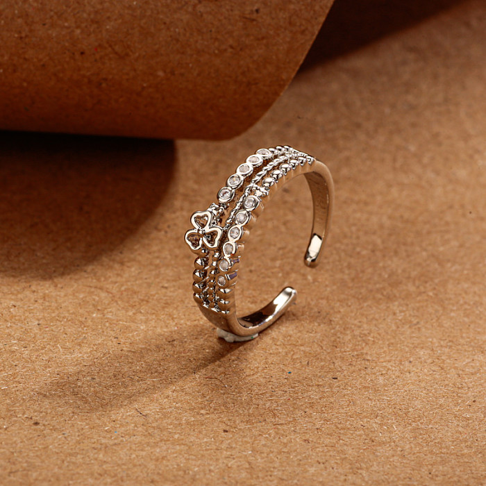 Bague en laiton avec motif de trèfle creux, 7mm de large, incrusté de zircon, arrangement de perles rondes creuses