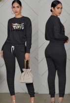 Fall Casual Sports Black Cartoon Printed Ruched Bloused And Matching Dtrawstring Pants Two Piece Set