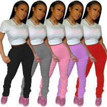 Fashion women's solid color Chic casual mid-waist Hip-lifting elastic pleated pants