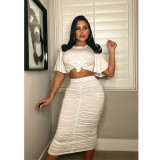 Sexy women's clothing, short-sleeved top + pleated bottom skirt solid color suit
